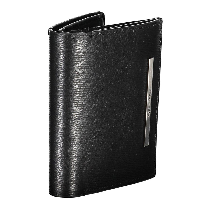 Sleek Bifold Wallet with RFID Block TechnologyExplore sophistication and practicality with this sleek wallet, designed with not just style but security in mind. Equipped with RFID blocking technology, it safeguards your personal data while offering ample