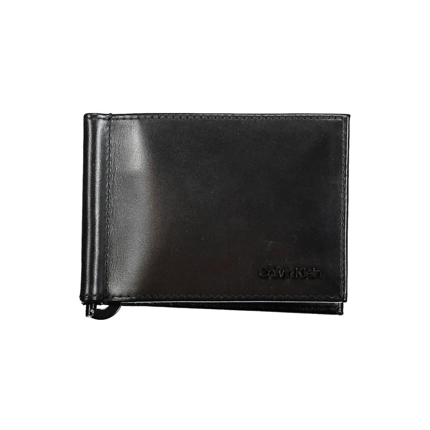 Black Leather Men WalletElevate your essentials with the sleek sophistication of a Calvin Klein wallet. Expertly crafted from premium leather, this piece is as functional as it is stylish. Boasting a practical money clip and double card spaces, it ensures
