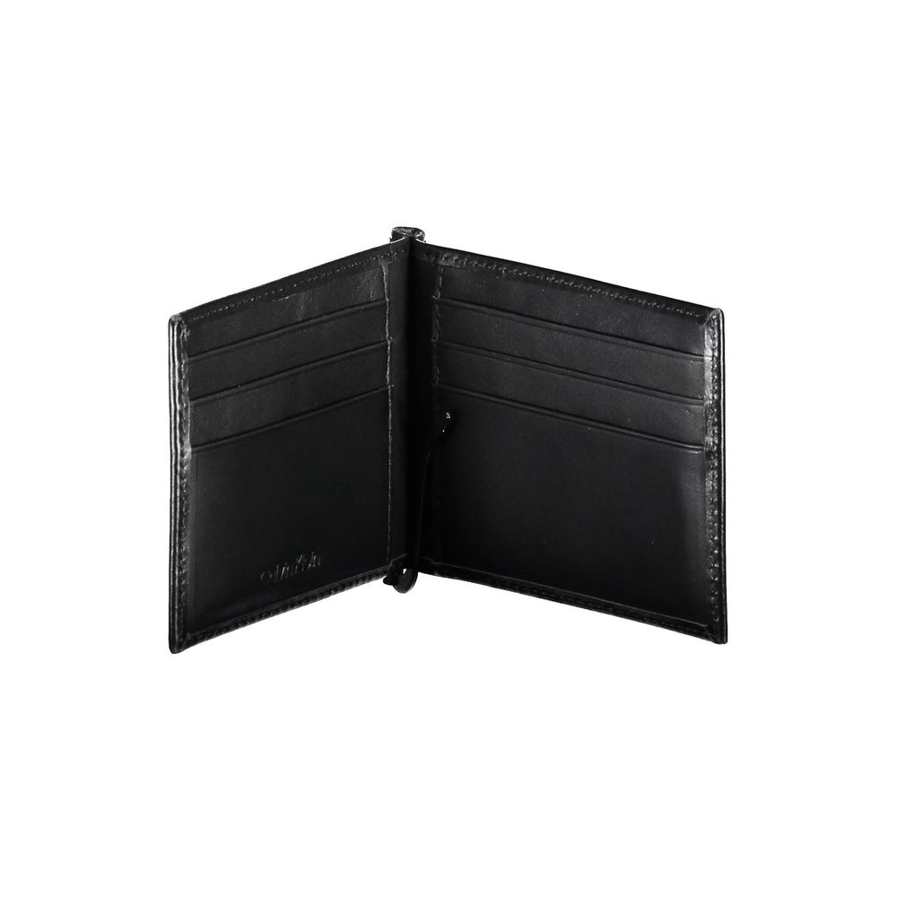 Black Leather Men WalletElevate your essentials with the sleek sophistication of a Calvin Klein wallet. Expertly crafted from premium leather, this piece is as functional as it is stylish. Boasting a practical money clip and double card spaces, it ensures