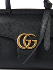 Black Leather GG Marmont HandbagGUCCI Gorgeous brand new, 100% Authentic Gucci women’s Black Leather GG Marmont Handbag. Model: GG Marmont Cellarius Color: Black/ Gold Hardware Material: 100% Leather 110cm removable and adjustable shoulder strap shoulder