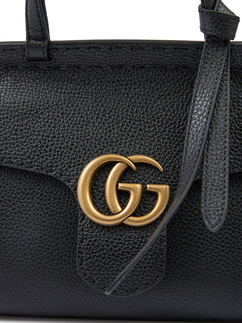Black Leather GG Marmont HandbagGUCCI Gorgeous brand new, 100% Authentic Gucci women’s Black Leather GG Marmont Handbag. Model: GG Marmont Cellarius Color: Black/ Gold Hardware Material: 100% Leather 110cm removable and adjustable shoulder strap shoulder