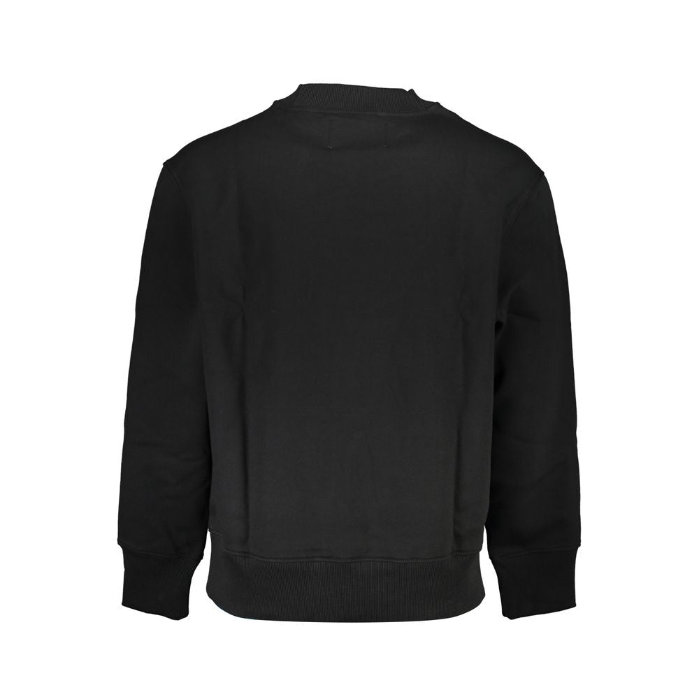 Black Cotton Men SweaterUnleash your style with this sleek Calvin Klein long-sleeved sweatshirt. Crafted to perfection, it offers a timeless crew neck design enhanced by the brand’s iconic print and logo, merging comfort with trendy aesthetics. Ideal for