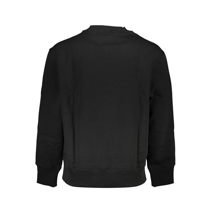 Black Cotton Men SweaterUnleash your style with this sleek Calvin Klein long-sleeved sweatshirt. Crafted to perfection, it offers a timeless crew neck design enhanced by the brand’s iconic print and logo, merging comfort with trendy aesthetics. Ideal for