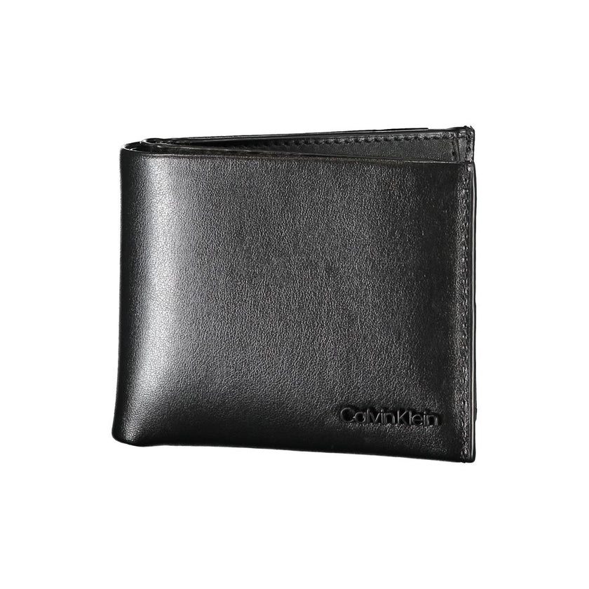Elegant Black Leather Dual-Compartment WalletStep up your accessory game with this sophisticated wallet, perfect for the modern man with a taste for classic style and utility. Crafted by the esteemed Calvin Klein, this wallet boasts two separate compartme