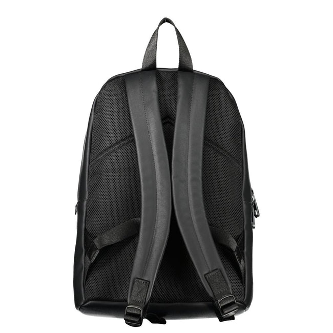 Elegant Urban Backpack with Laptop CompartmentExperience functionality meeting style with this sleek Calvin Klein backpack. Designed for the modern urbanite, it comes equipped with a dedicated laptop compartment, pen holder spaces, and an easily accessibl