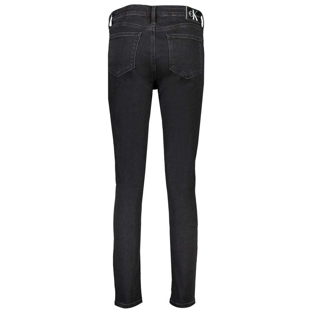 Black Cotton Women's Skinny JeanElevate your wardrobe with a sleek touch from Calvin Klein’s Mid Rise Skinny Jeans. Crafted with precision, these jeans merge classic 5-pocket design and modern sustainability using 20% recycled cotton. Tailored to accentua