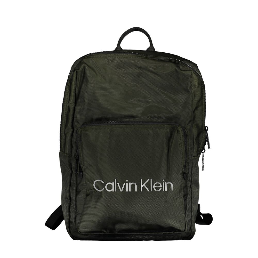 Green Polyester Men BackpackStep into the urban jungle with Calvin Klein’s sleek backpack, crafted for the modern voyager. Merging style with functionality, this green accessory boasts an external pocket for easy access, an internal laptop space to keep y