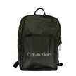 Green Polyester Men BackpackStep into the urban jungle with Calvin Klein’s sleek backpack, crafted for the modern voyager. Merging style with functionality, this green accessory boasts an external pocket for easy access, an internal laptop space to keep y
