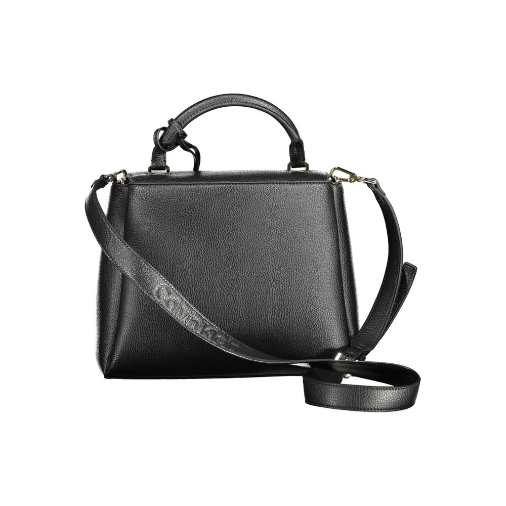 Black Polyester Women HandbagStep into the vanguard of fashion with the Calvin Klein handbag, expertly designed to encapsulate both functionality and elegance. This sophisticated accessory is a testament to the mindful fashionista, boasting 100% recycled