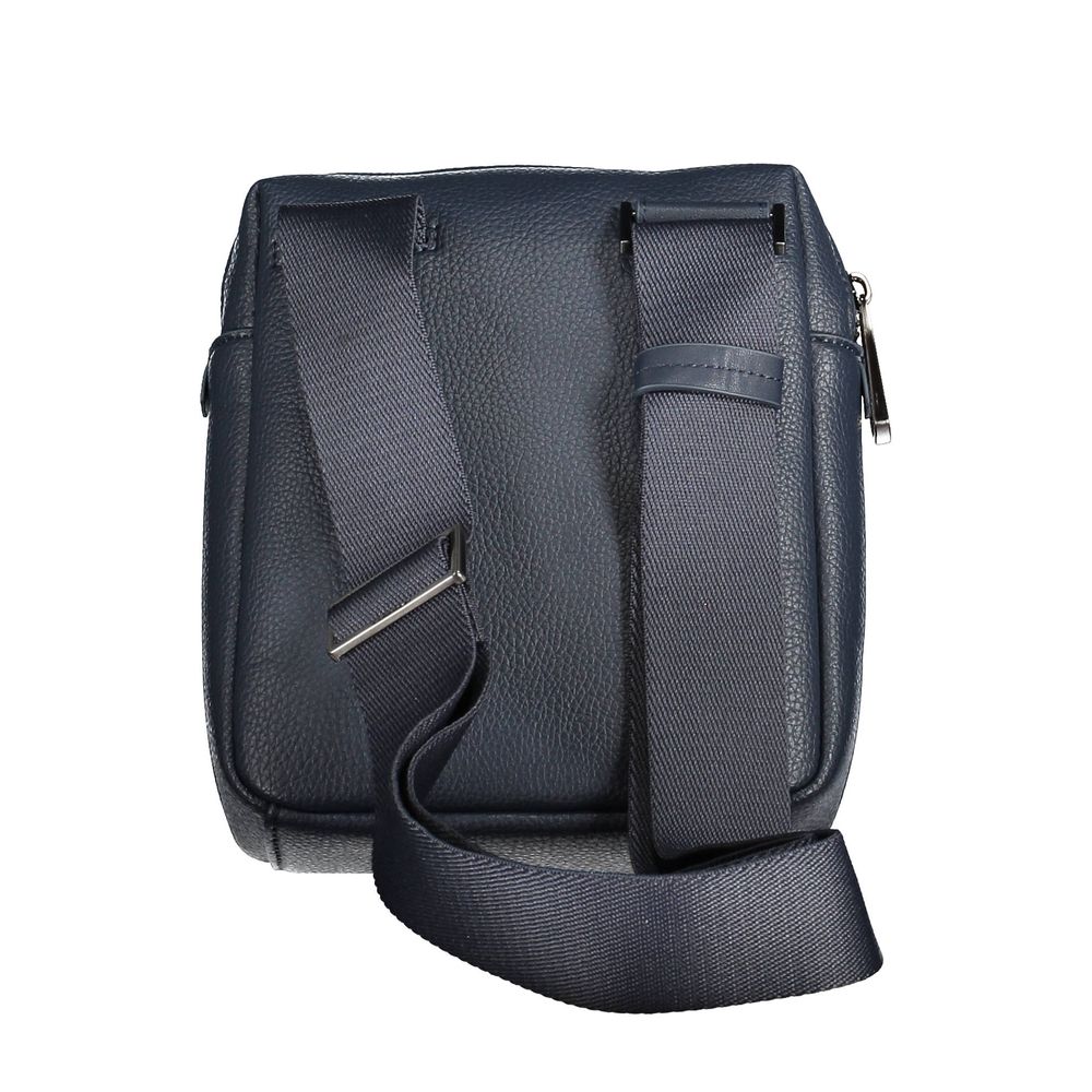 Blue Polyester Men Shoulder BagElevate your accessory game with a touch of sustainability courtesy of Calvin Klein. This dynamic blue shoulder bag boasts an adjustable strap for versatile wear, complemented by a sleek zipper closure and a discreet yet rec