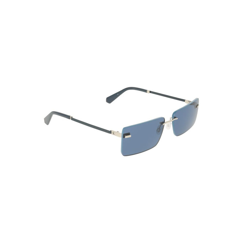 Blue Metal Women SunglassDelve into the world of chic sophistication with these striking Calvin Klein sunglasses. Crafted with precision, their metal frames boast a sleek rectangular lens that will elevate any ensemble. The captivating blue lenses not onl