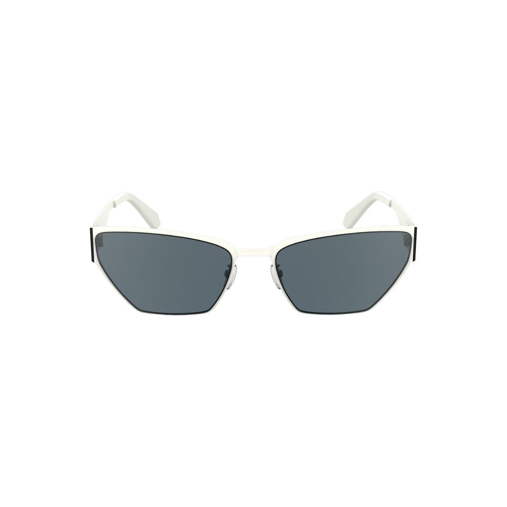 White Metal Women SunglassDare to make a statement with these striking Calvin Klein sunglasses, where modern sophistication meets fierce style. Constructed with a sleek metal frame, they feature a captivating cat-eye shape that will set you apart from the