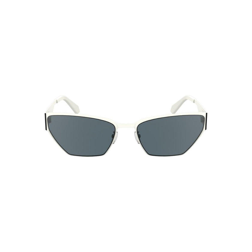 White Metal Women SunglassDare to make a statement with these striking Calvin Klein sunglasses, where modern sophistication meets fierce style. Constructed with a sleek metal frame, they feature a captivating cat-eye shape that will set you apart from the