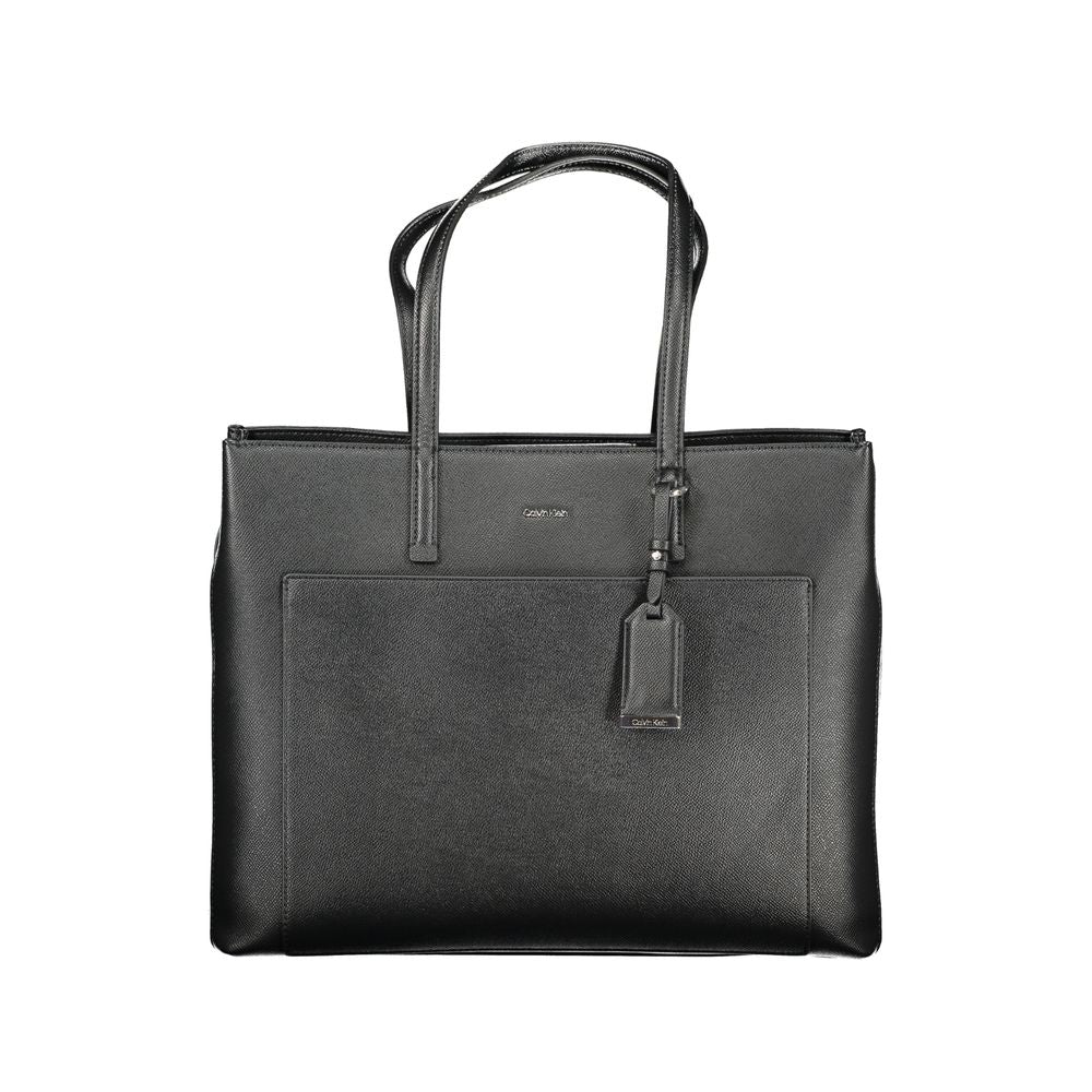 Black Polyethylene Women HandbagDiscover the epitome of modern elegance with this Calvin Klein handbag. Crafted with meticulous attention to detail, it boasts contrasting accents that set the tone for a bold fashion statement. Keep your essentials organiz