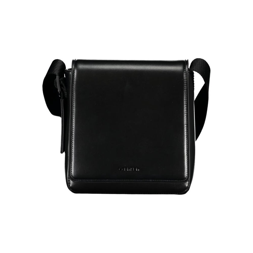 Sleek Black Shoulder Bag with Logo DetailElevate your everyday style with this sleek and functional shoulder bag by Calvin Klein. Crafted with a blend of polyester and polyethylene for durability, it features an adjustable shoulder strap for personalized