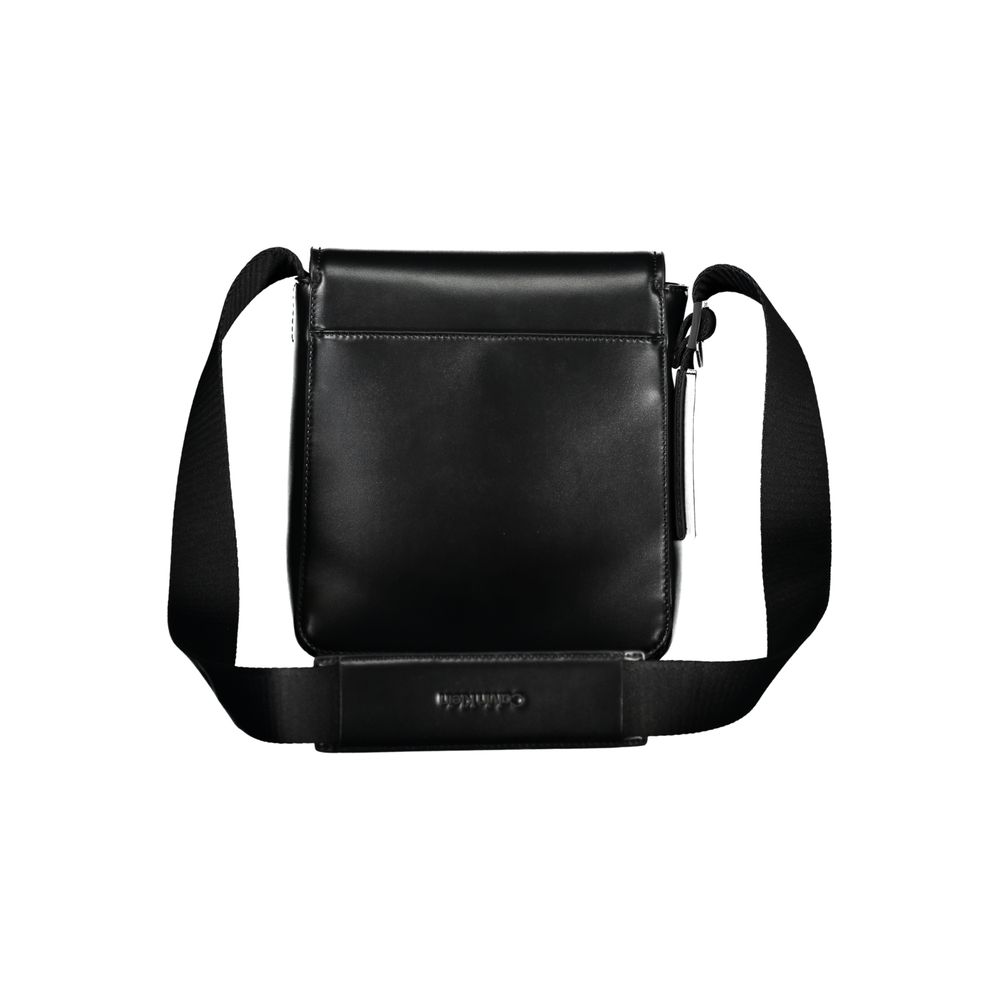 Sleek Black Shoulder Bag with Logo DetailElevate your everyday style with this sleek and functional shoulder bag by Calvin Klein. Crafted with a blend of polyester and polyethylene for durability, it features an adjustable shoulder strap for personalized
