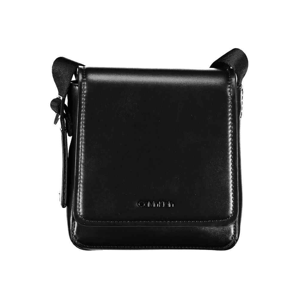 Sleek Black Shoulder Bag with Logo DetailElevate your everyday style with this sleek and functional shoulder bag by Calvin Klein. Crafted with a blend of polyester and polyethylene for durability, it features an adjustable shoulder strap for personalized