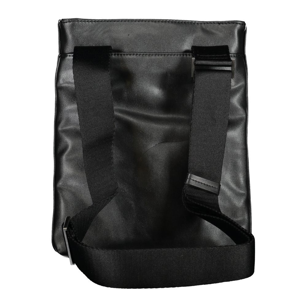 Sleek Black Shoulder Bag with Contrast DetailsDiscover functional elegance with this Calvin Klein shoulder bag, perfect for the modern man on the go. Crafted with sustainability in mind, featuring 50% recycled polyester, this accessory does not compromise