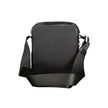 Black Polyester Men Shoulder BagElevate your accessory game with the sleek Calvin Klein shoulder bag, where functionality meets refined style. This bag is designed for the modern man on-the-go, featuring a durable build with a sharp black finish that comm