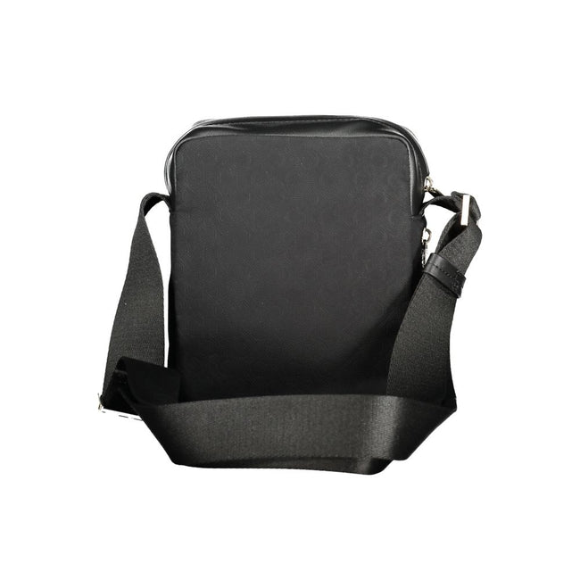 Black Polyester Men Shoulder BagElevate your accessory game with the sleek Calvin Klein shoulder bag, where functionality meets refined style. This bag is designed for the modern man on-the-go, featuring a durable build with a sharp black finish that comm
