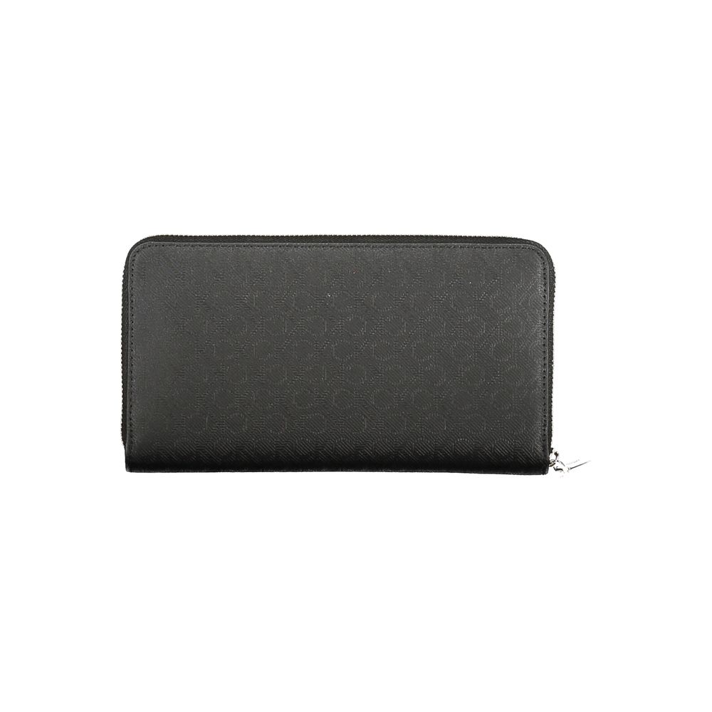 Black Polyester Women WalletElevate your everyday essentials with the Calvin Klein sophistication in this sleek wallet. Designed for the modern trendsetter, this wallet offers a dual-compartment design that is both elegant and practical. An external pocke