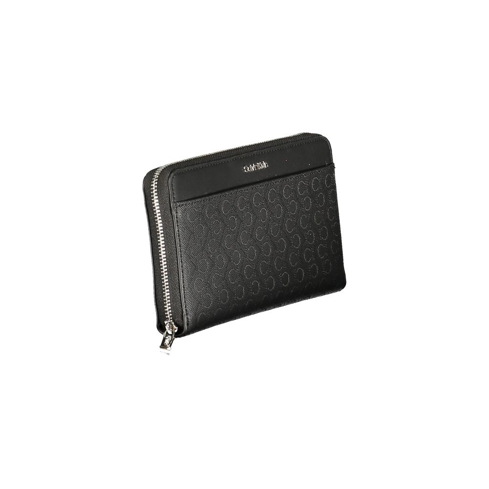 Black Polyester Women WalletElevate your everyday essentials with the Calvin Klein sophistication in this sleek wallet. Designed for the modern trendsetter, this wallet offers a dual-compartment design that is both elegant and practical. An external pocke