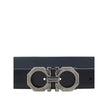 Black Calf Leather Bos Taurus Regular BeltFerragamo’s Reversible leather Belt features a double-face design that allows you to choose between two different looks. The metal buckle is embellished with the brand’s iconic Gancini logo, with the Ferragamo sig