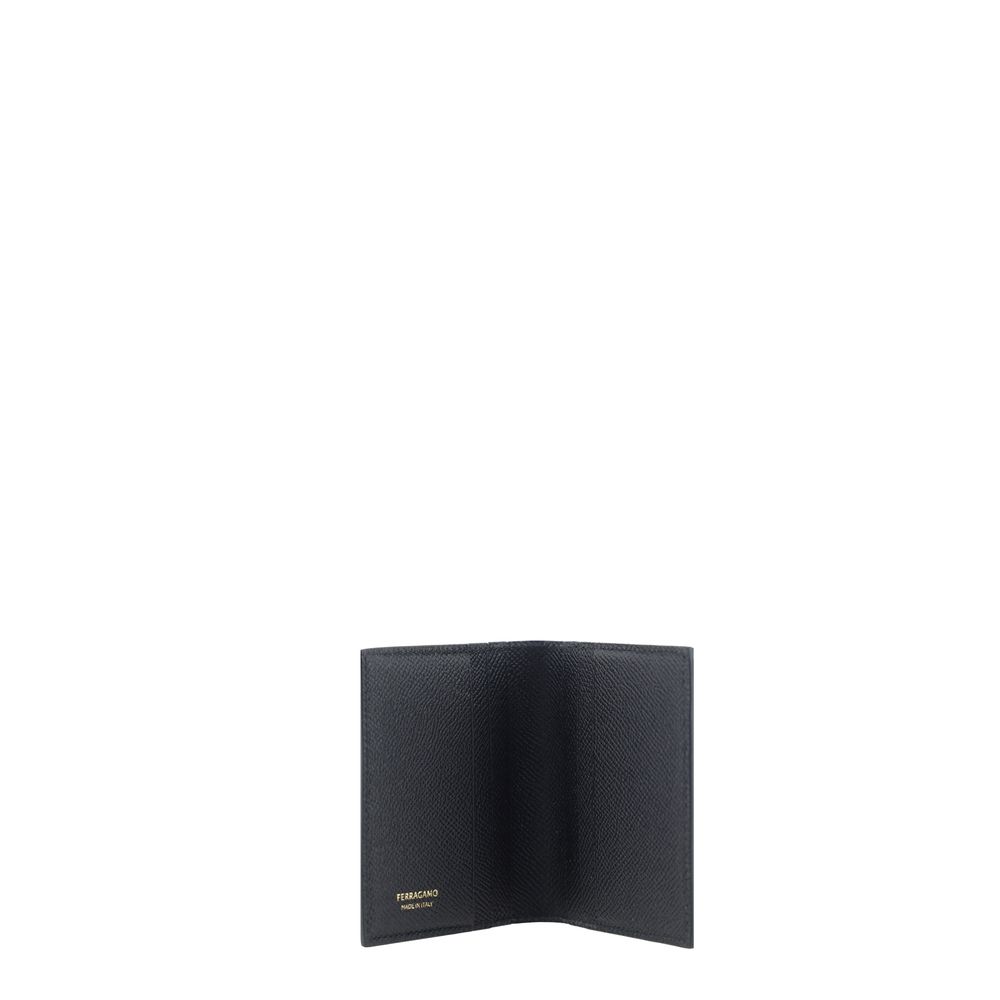 Black Calf Leather Bos Taurus WalletThe Ferragamo Revival leather Card Holder is crafted from premium leather and finished with a sophisticated metal plaque with the iconic logo applique on the front. The billfold style offers a slim yet functional struct