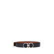 Brown Calf Leather Bos Taurus Regular BeltFerragamo’s reversible Gancini leather Belt features a three-dimensional buckle with the brand’s iconic Gancini logo. The reversible monochrome grained leather design offers two style options, making it versatile