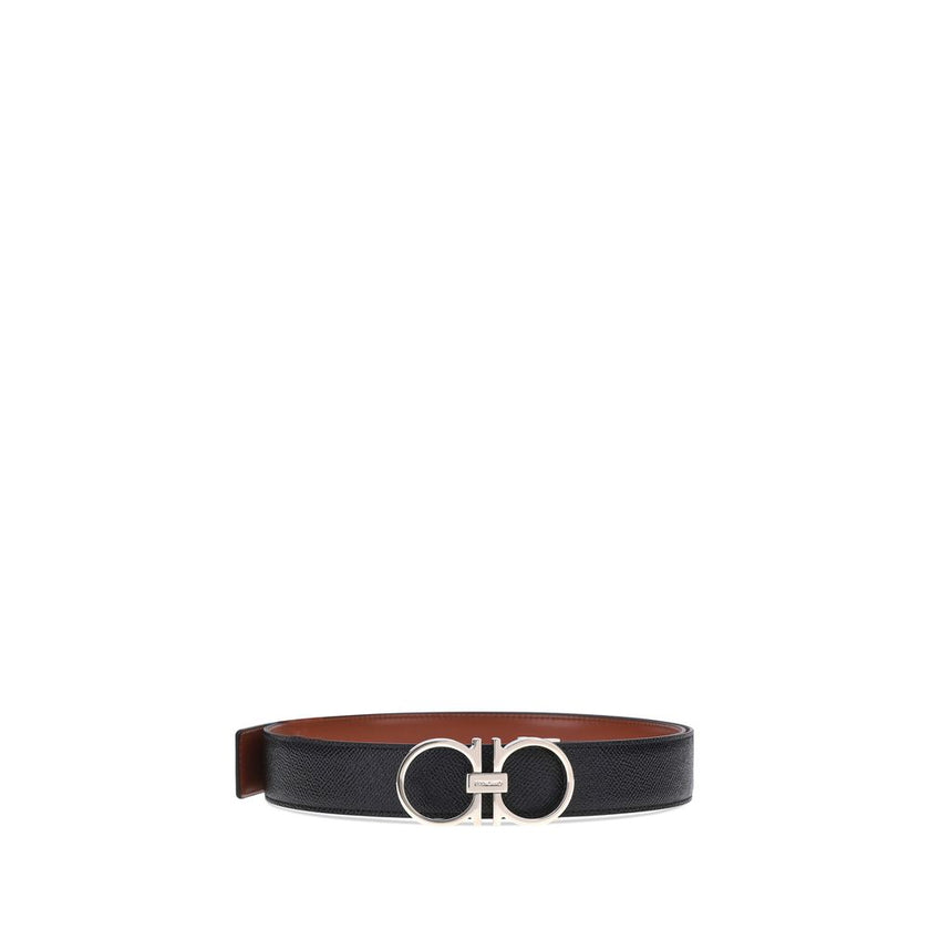 Brown Calf Leather Bos Taurus Regular BeltFerragamo’s reversible Gancini leather Belt features a three-dimensional buckle with the brand’s iconic Gancini logo. The reversible monochrome grained leather design offers two style options, making it versatile