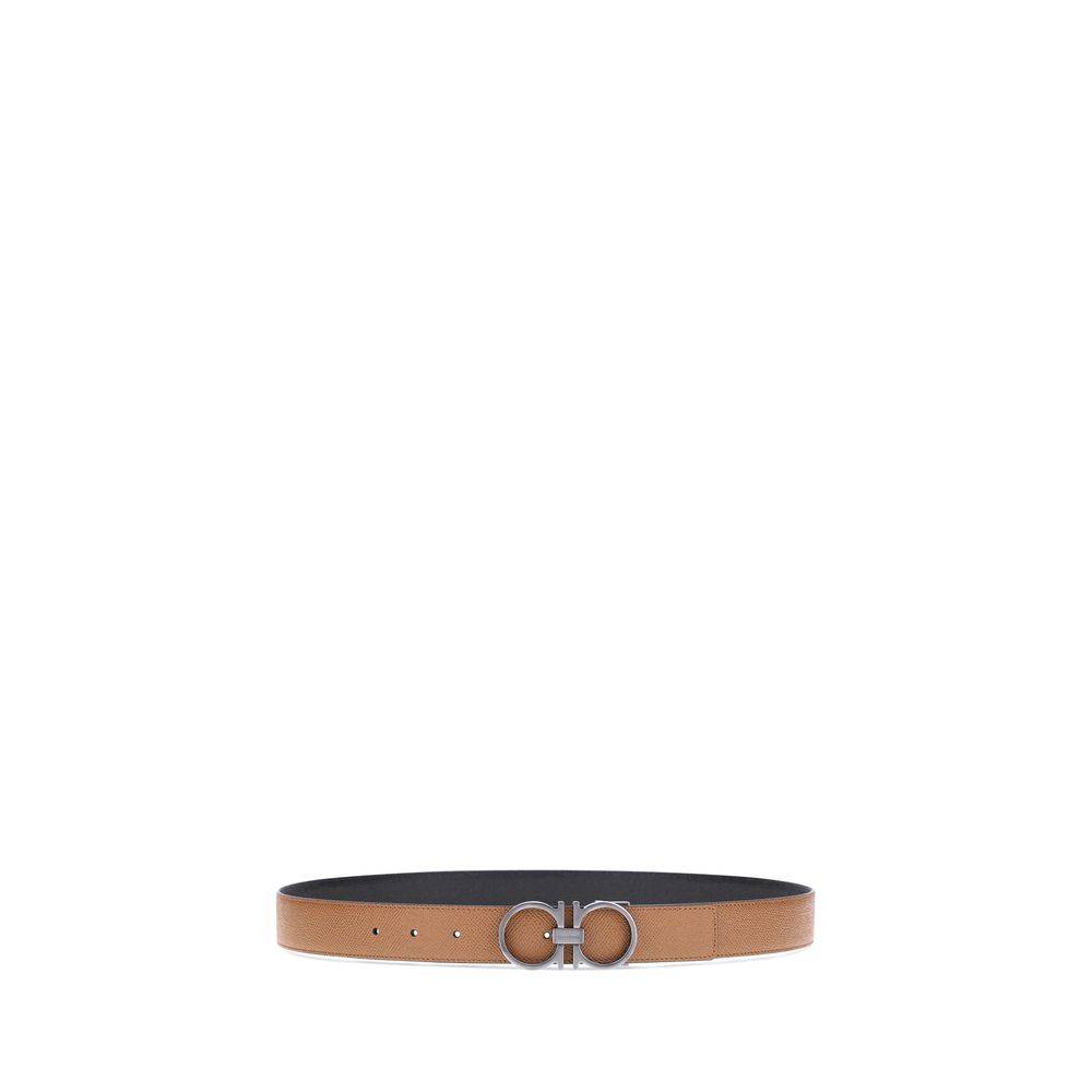 Brown Calf Leather Bos Taurus Regular BeltFerragamo’s Gancini reversible leather Belt features a three-dimensional buckle with the brand’s iconic Gancini logo. The reversible monochrome grained leather design offers two style options, making it versatile