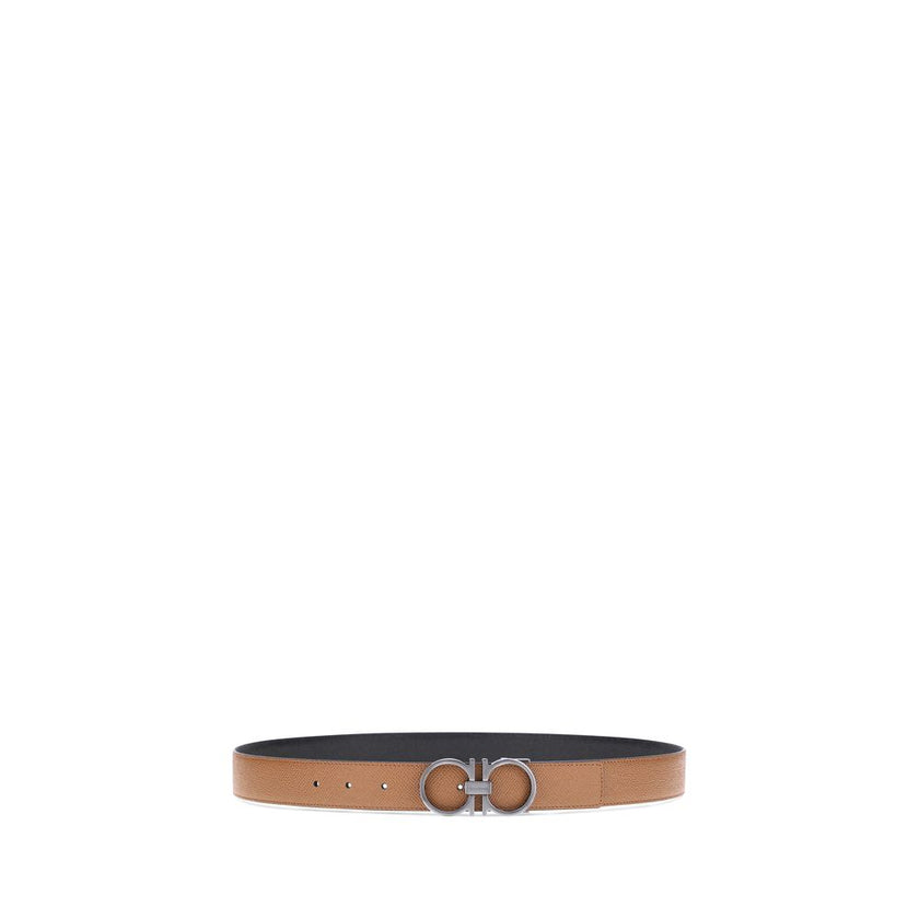 Brown Calf Leather Bos Taurus Regular BeltFerragamo’s Gancini reversible leather Belt features a three-dimensional buckle with the brand’s iconic Gancini logo. The reversible monochrome grained leather design offers two style options, making it versatile