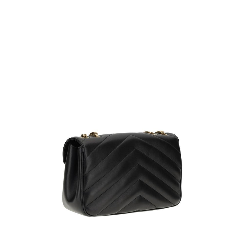 Black Calf Leather Bos Taurus Shoulder BagThe LouLou Shoulder Bag by Saint Laurent is an icon of timeless elegance. Crafted with the unmistakable quilted design, it features a front closure with magnetic flap embellished with the brass logo applied on the