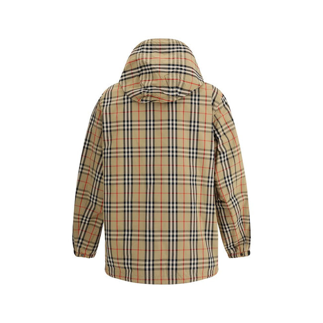 Multicolor Polyamide Rain CoatBurberry’s reversible Waterproof Jacket combines functionality and iconic style in a practical, modern design. Featuring an adjustable drawstring hood, it features a double-slider front zipper closure, elastic cuffs and two s