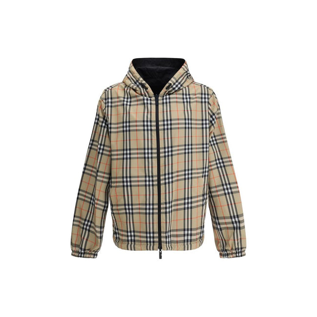 Multicolor Polyester Shell JacketThe Archive Check reversible Jacket by Burberry is a versatile and stylish garment that offers two looks in one. On one side, it sports the brand’s iconic check pattern, while on the other it features a solid-color design