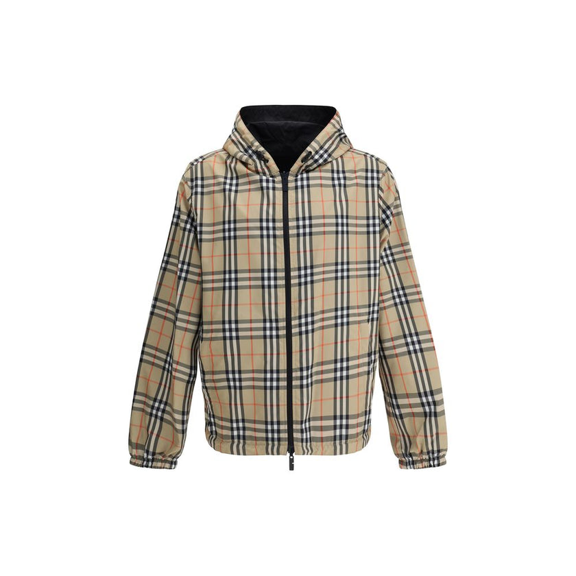 Multicolor Polyester Shell JacketThe Archive Check reversible Jacket by Burberry is a versatile and stylish garment that offers two looks in one. On one side, it sports the brand’s iconic check pattern, while on the other it features a solid-color design