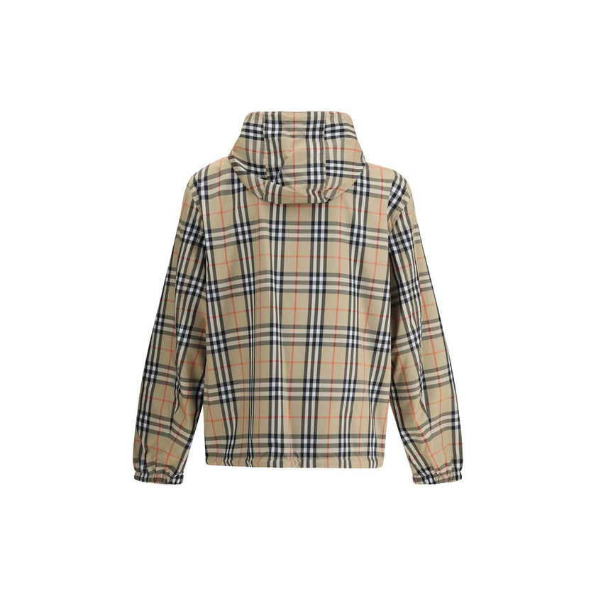 Multicolor Polyester Shell JacketThe Archive Check reversible Jacket by Burberry is a versatile and stylish garment that offers two looks in one. On one side, it sports the brand’s iconic check pattern, while on the other it features a solid-color design