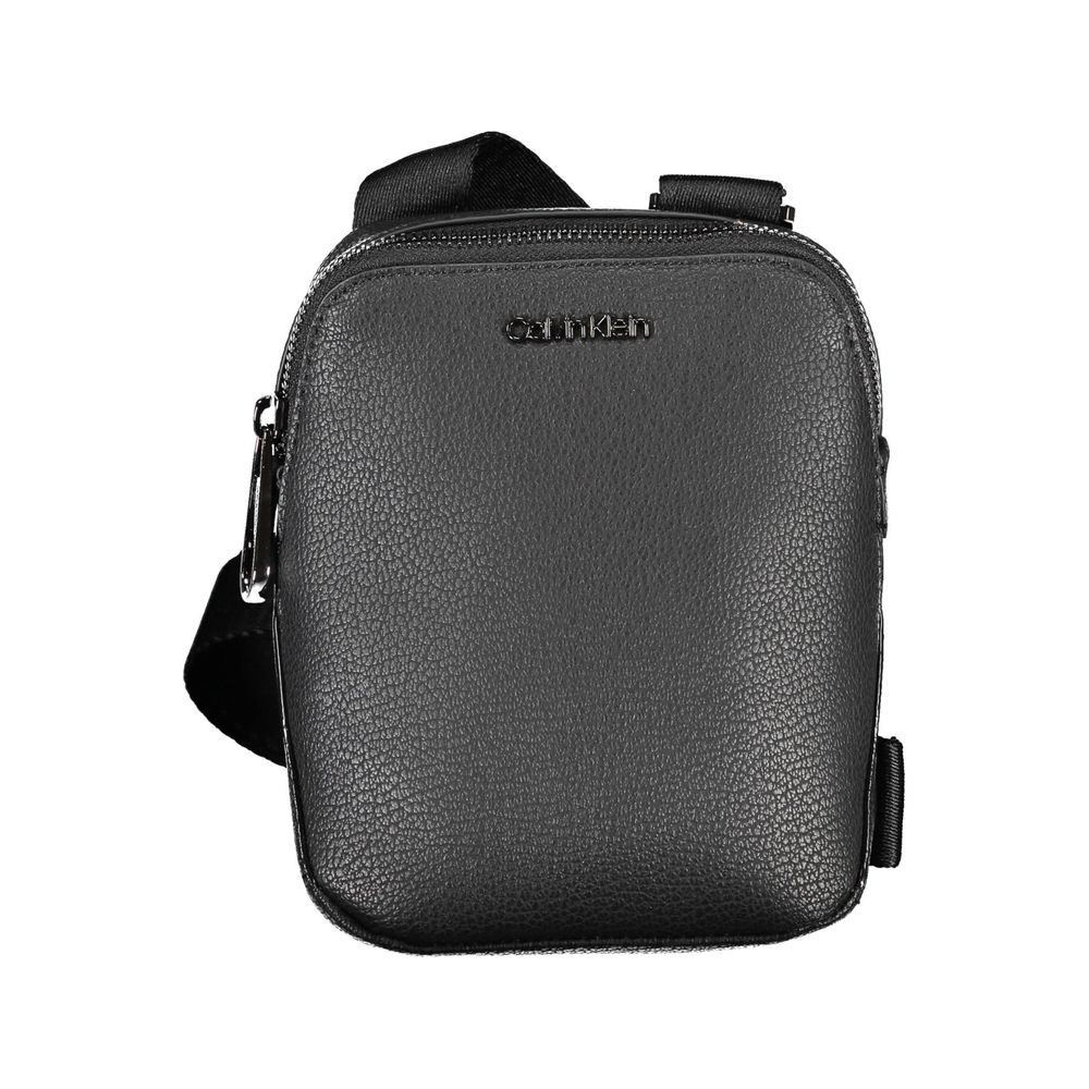 Sleek Black Shoulder Bag with Logo DetailDiscover the perfect blend of style and practicality with this sleek black shoulder bag, designed for the modern individual on the go. Featuring an adjustable shoulder strap for customized comfort, a handy external