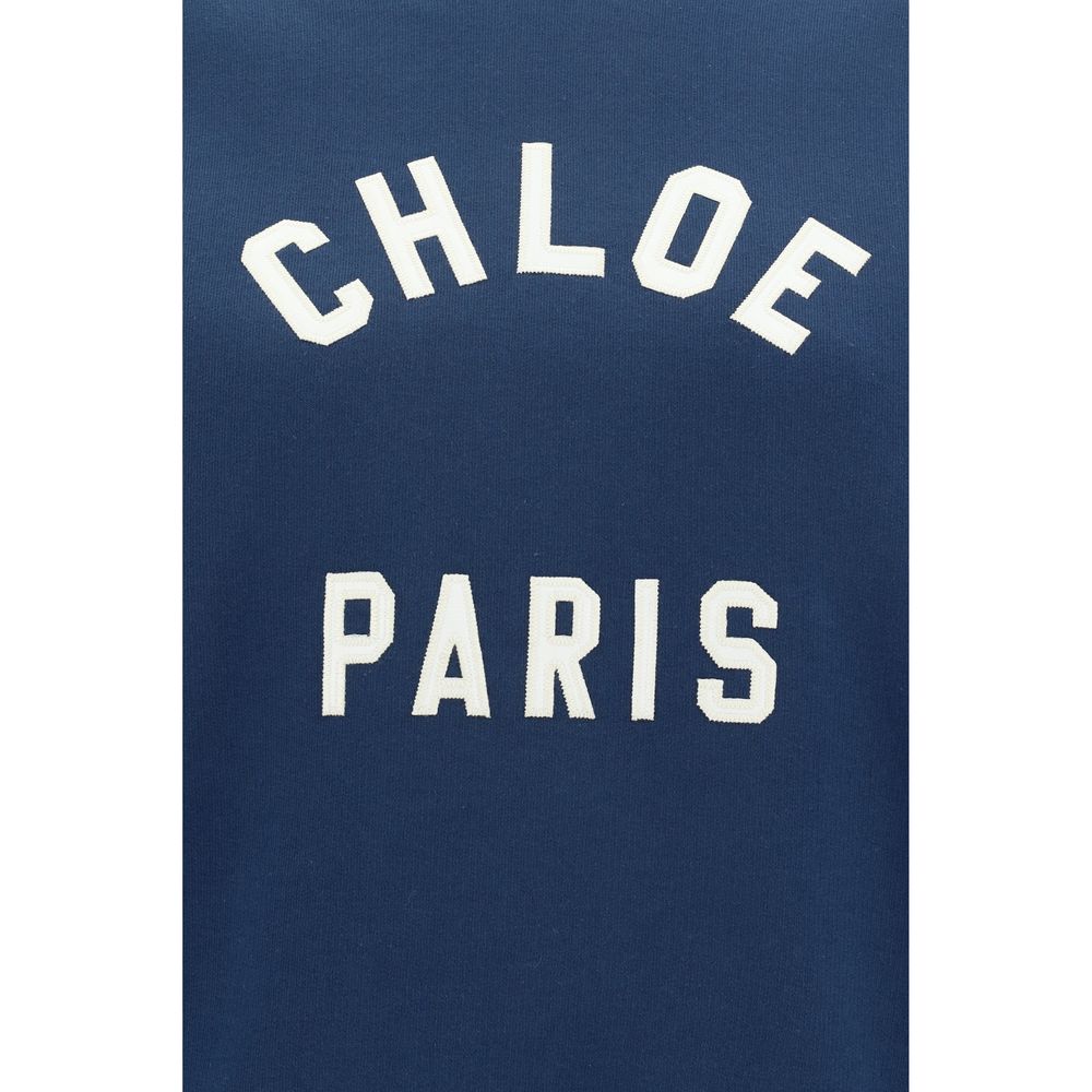 Blue Cotton SweatshirtCotton Sweatshirt by Chloé, ribbed crew neck, ribbed cuffs, ribbed hem, contrasting iconic brand monogram at front, monochrome design, regular fit. Season: AW25 Composition: 100% Cotton MADE IN ITALYBlue Cotton Sweatshirt${tagsChloéA