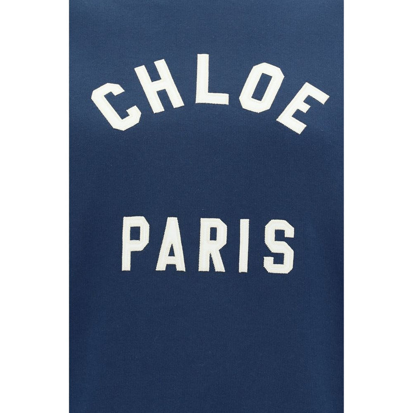 Blue Cotton SweatshirtCotton Sweatshirt by Chloé, ribbed crew neck, ribbed cuffs, ribbed hem, contrasting iconic brand monogram at front, monochrome design, regular fit. Season: AW25 Composition: 100% Cotton MADE IN ITALYBlue Cotton Sweatshirt${tagsChloéA