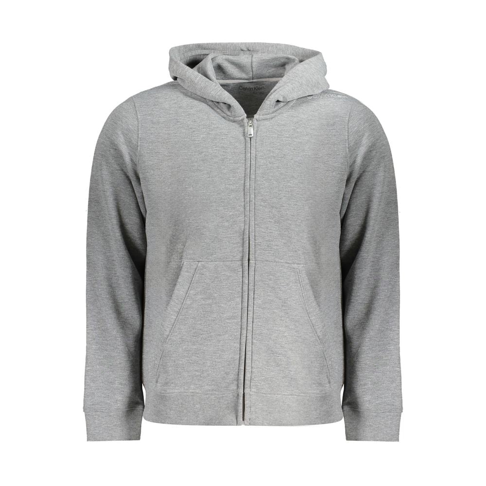 Gray Recycled Polyester Men HoodieDive into the epitome of sporty luxury with Calvin Klein’s latest creation—the sleek, long-sleeved sports hoodie that exudes effortless style. A standout piece for the eco-conscious trendsetter, it’s crafted from 100% rec