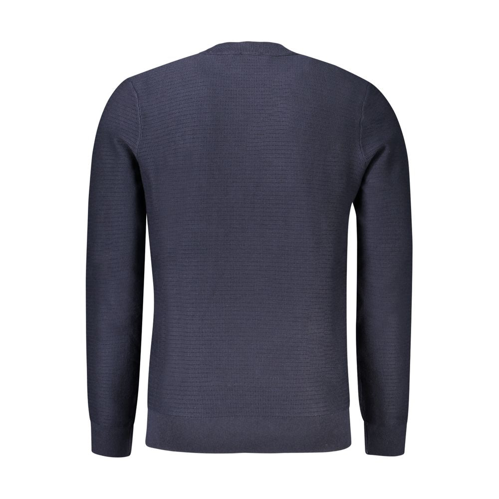 Blue Cotton Men SweaterIndulge in understated luxury with this exquisite Hugo Boss sweater. Crafted with a blend of 95% cotton and a hint of 5% cashmere, it offers unmatched comfort with a touch of sophistication. The long sleeves and snug crew neck provi