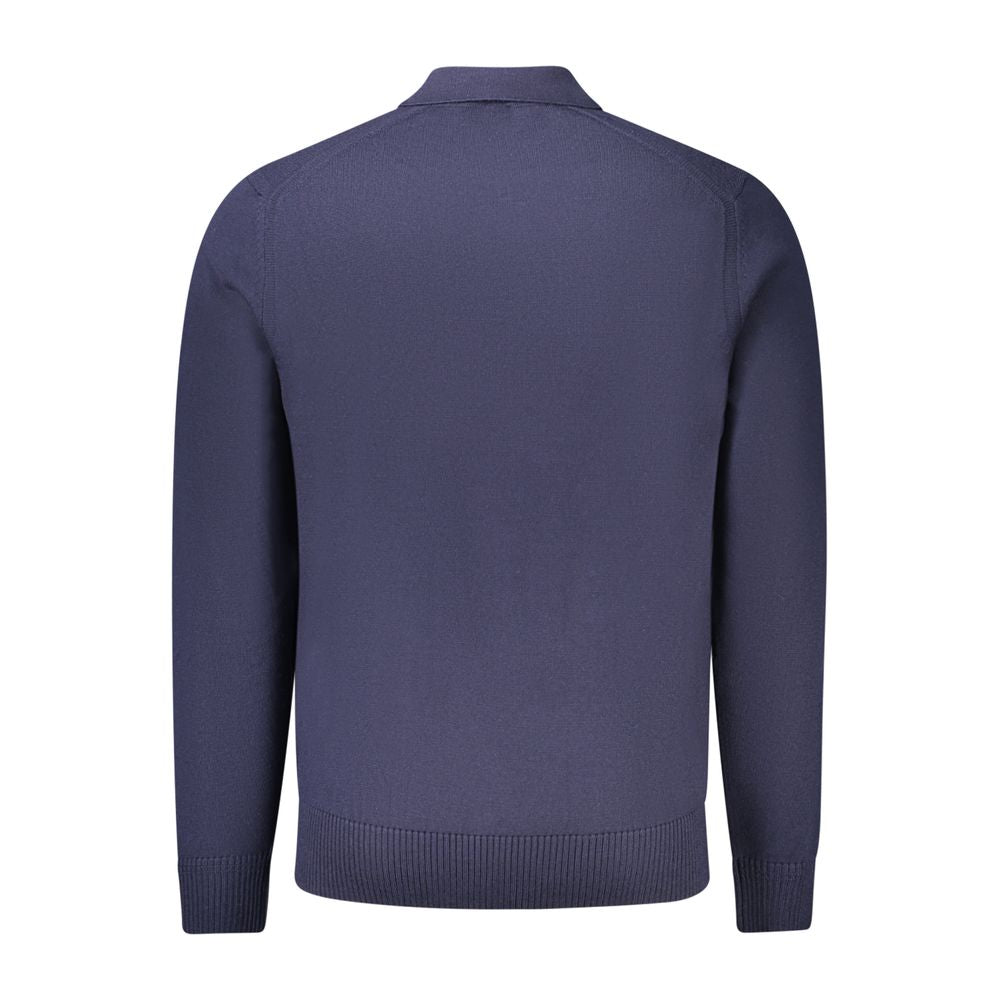 Blue Wool Mens SweaterDress in sophistication with this Hugo Boss long-sleeved sweater, epitomizing the blend of luxury and casual style. The striking blue hue is perfectly complemented by the distinctive Hugo Boss embroidery and logo, adding that touch o