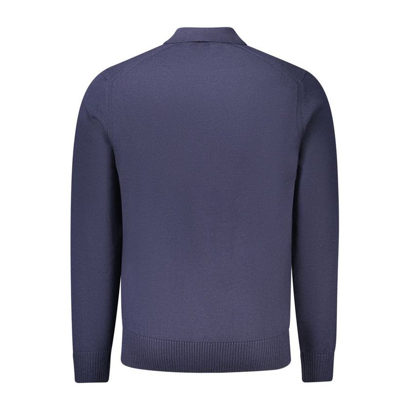 Blue Wool Mens SweaterDress in sophistication with this Hugo Boss long-sleeved sweater, epitomizing the blend of luxury and casual style. The striking blue hue is perfectly complemented by the distinctive Hugo Boss embroidery and logo, adding that touch o