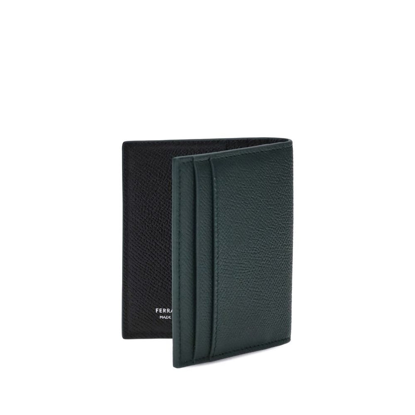 Black Lamb Ovis Aries Aries WalletFerragamo’s leather Card Holder combines elegance and functionality in a compact, refined design. Made of fine grained leather, it features slots both inside and out, offering surprisingly generous capacity, ideal for the