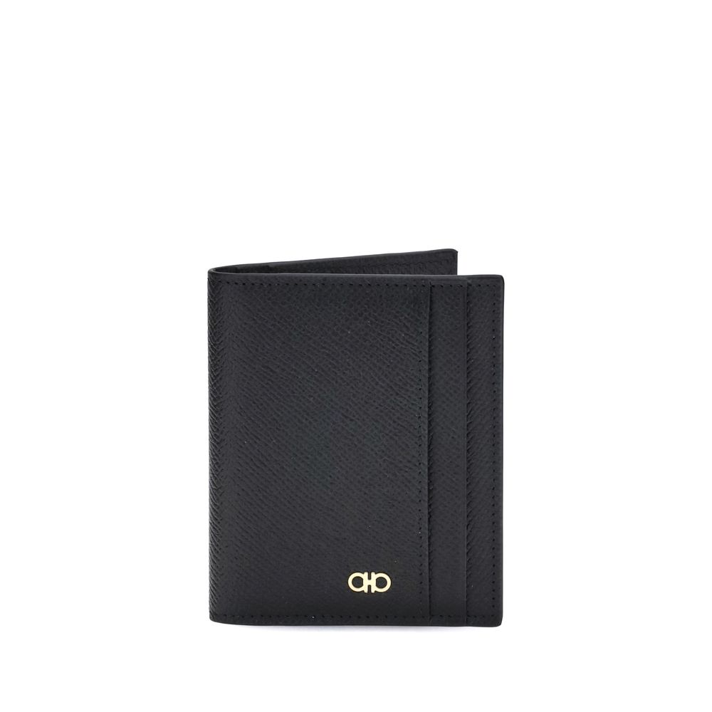 Black Calf Leather Bos Taurus WalletFerragamo’s Leather Card Holder combines functionality and elegance in a compact design. Featuring 8 internal and 2 external slots, it offers generous capacity ideal for the dynamic man. The Gancini ornament on the fron