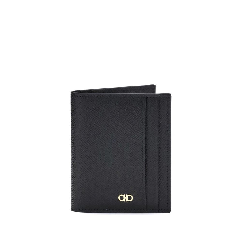 Black Calf Leather Bos Taurus WalletFerragamo’s Leather Card Holder combines functionality and elegance in a compact design. Featuring 8 internal and 2 external slots, it offers generous capacity ideal for the dynamic man. The Gancini ornament on the fron