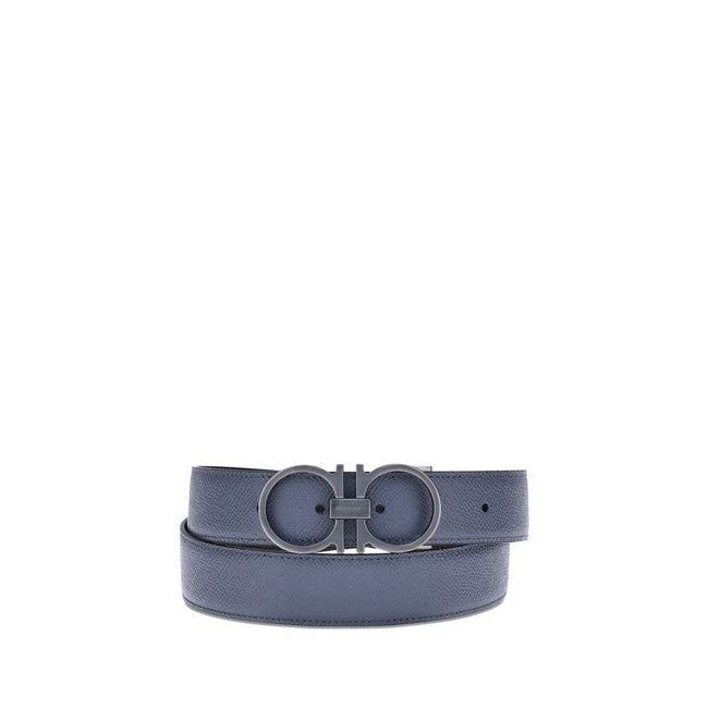 Blue Calf Leather Bos Taurus Regular BeltFerragamo’s Reversible Belt is a sophisticated accessory, crafted in shaded tumbled leather for an elegant and versatile effect. The Gancini buckle, the brand’s iconic symbol, completes the design with a distinctiv