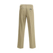 Beige Cotton Chino PantsPrada’s chino Pants offer essential elegance with contemporary style. Featuring a front zipper and button closure, they feature two side welt pockets and back pockets, one of which is embellished with the brand’s iconic logo. Waist