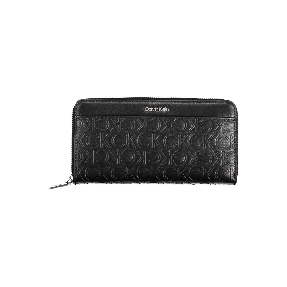 Black Polyethylene Women WalletUnveil the epitome of sophistication with this sleek Calvin Klein wallet, perfect for the modern trendsetter who values form and function. Boasting five compartments and double card slots, it’s a blend of style and security